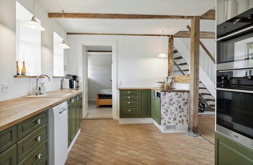 Majbolle House | Nostalgic charm in a yellow timber house