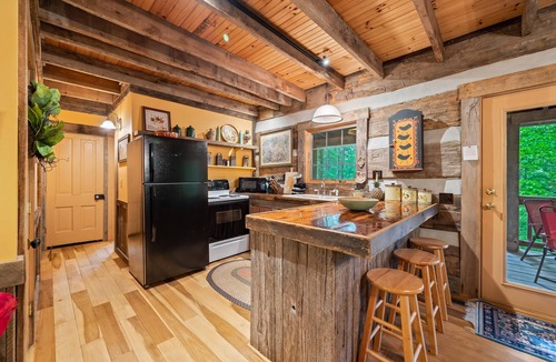 Gnaw Bone Cabin | Nostalgic log cabin with antique furnishings. Pet-friendly!
