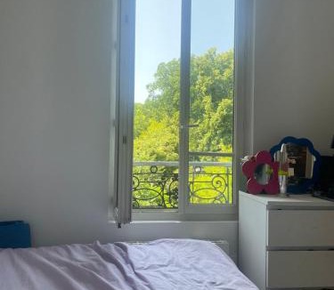 Amerique Apartment | Notre appartement vue sur les Buttes Chaumont