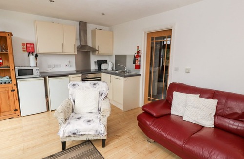 Ivegill Cottage | NUTHATCH, pet friendly, with open fire in High Head Castle Farm