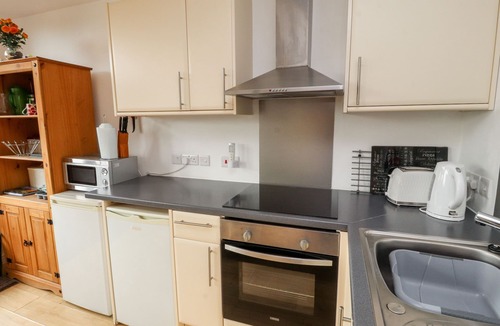 Ivegill Cottage | NUTHATCH, pet friendly, with open fire in High Head Castle Farm