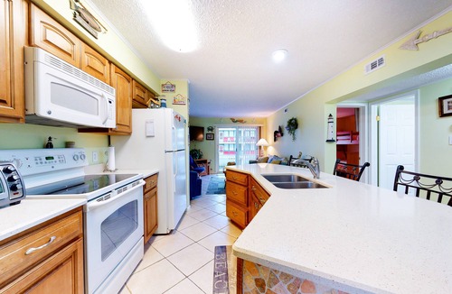 Midtown Ocean City Condo | Ocean Block Condo with Balcony, Central AC, WiFi, Laundry & Shared Pool