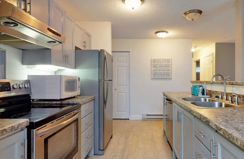 Ocean Park Condo | Ocean Park Meadows #54 | Pool | Gym | Club House | Patio | Tennis | Bayley Vacation Rentals