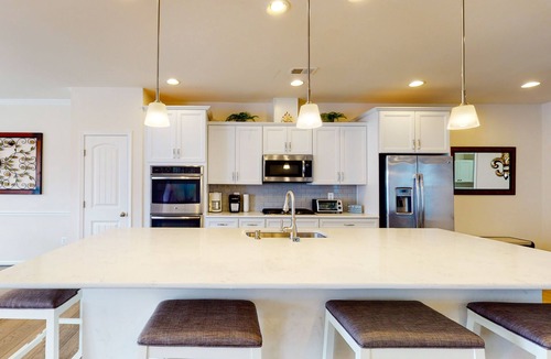 Frankford House | Ocean View Beach Club townhouse with grill, pool, gym, & tennis