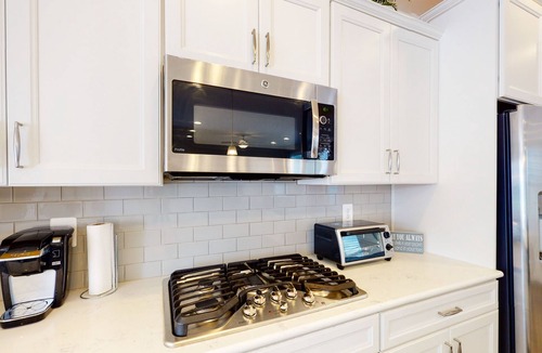 Frankford House | Ocean View Beach Club townhouse with grill, pool, gym, & tennis