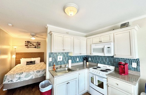 Atlantic Beach Apartment | Ocean View Condo Kitchen Pool Private Beach Access