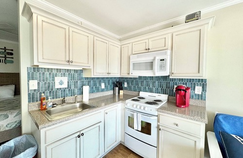 Atlantic Beach Apartment | Ocean View Condo Kitchen Pool Private Beach Access