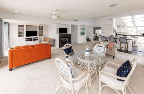Croatan Beach House | Ocean-view home that is within a 2 minute walk to the beach w/rooftop deck