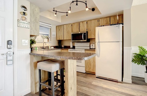 New Smyrna Beach Condo | Oceanfront Condo with Pool, BBQ & Steps from Flagler Ave