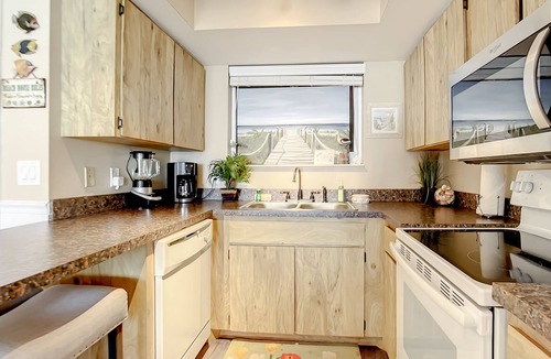 New Smyrna Beach Condo | Oceanfront Condo with Pool, BBQ & Steps from Flagler Ave