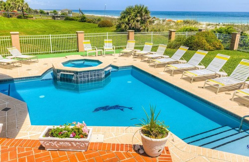Golden Mile House | Oceanfront duplex with pool spa putting green walkway to beach