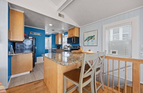 Frisco House | Oceanfront home w/elevator, private hot tub, shared pool, beach access, & WiFi