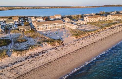 North Truro House | Oceanfront hotel suite at beachfront Sandbars Inn with balcony AC & firepit