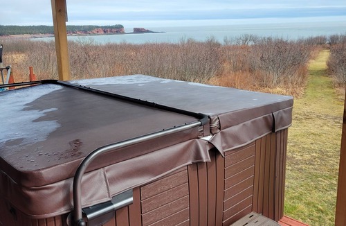 Saint John County House | Oceanfront - Million Dollar View with a Hot Tub!