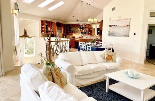 Orlando Beach House | OCEANFRONT PARADISE with Direct Beach Access. Hammocks, Heated Pool, Fire Pit