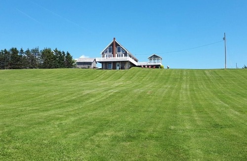 Brae Cottage | Oceanfront PEI Home with Ocean Views, Wraparound Deck & Private Beach