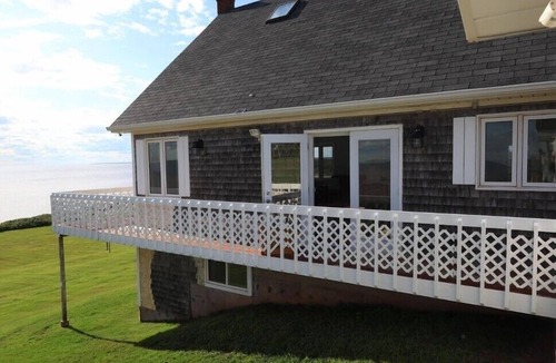 Brae Cottage | Oceanfront PEI Home with Ocean Views, Wraparound Deck & Private Beach