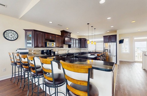 Surf City House | Oceanfront estate - heated pool, pool spa, elevator, pool table & cook's kitchen