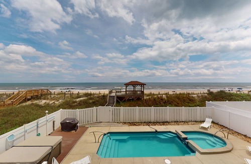 Surf City House | Oceanfront estate - heated pool, pool spa, elevator, pool table & cook's kitchen