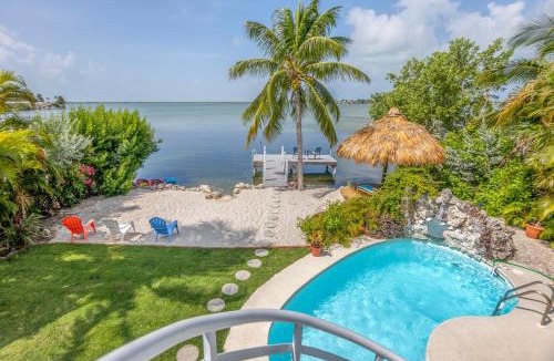 Bay Point House | Oceanfront villa with private beach, heated pool, tiki and boat dock