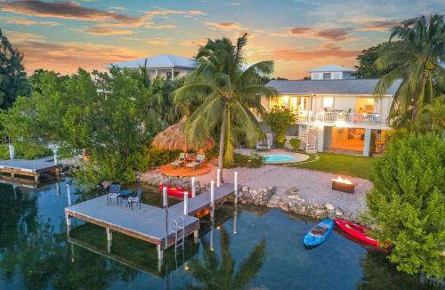 Bay Point House | Oceanfront villa with private beach, heated pool, tiki and boat dock