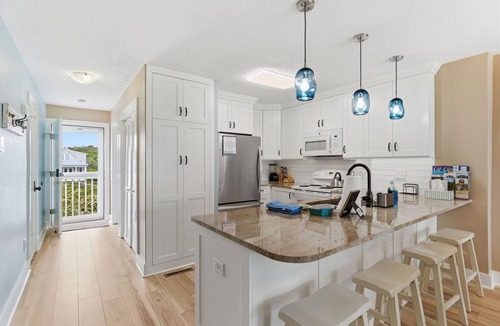 Kure Beach Condo | OD 1306 Oceanfront top floor condo. Indoor and outdoor pools