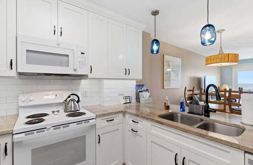 Kure Beach Condo | OD 1306 Oceanfront top floor condo. Indoor and outdoor pools