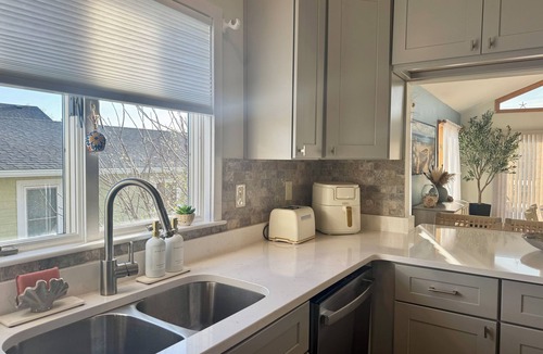 Colington Harbour House | Odyssey at Collington Harbour – Waterfront with Dock + Boat Lift 5BR