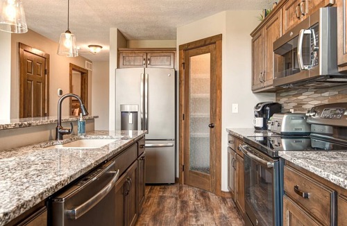 Spirit Lake House | Okoboji Oasis: High-end cabin with pool, fire pit, and two king beds