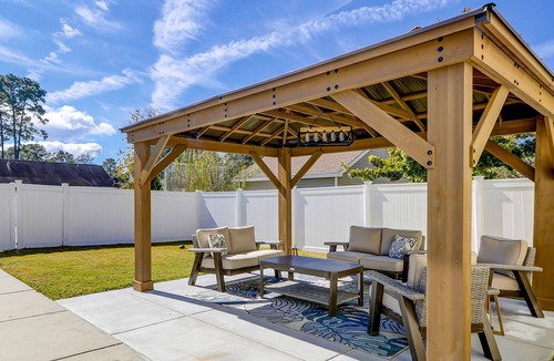 Old Town Bluffton House | Old Town retreat with golf cart, fenced yard, covered porch, & outdoor living