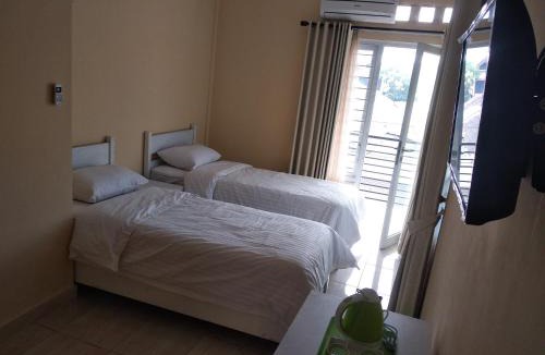 Sleman Hotel | Omah Inap D24 Syariah near Universitas Aisyiah Yogyakarta Mitra RedDoorz