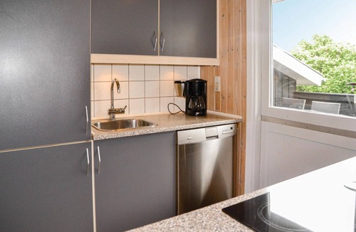 Henne Strand House | On a dune plot lies this beautiful vacation home.
