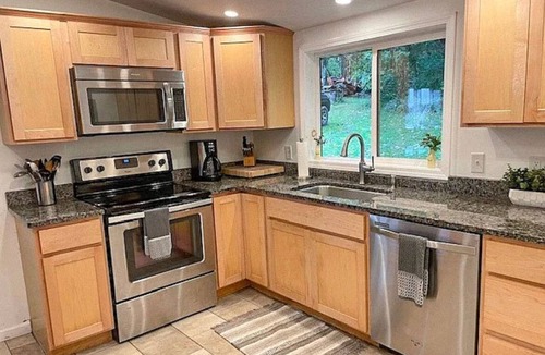 Moravia Cottage | ON LAKE! Peaceful Private Level Beach, Pet Friendly,Stream,Dock,Woods,Rowboat!