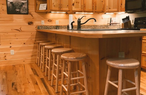 Gatlinburg - Pigeon Forge Cabin | One acre private 4 bedroom + loft! Hot tub, fire pit & game rooms!