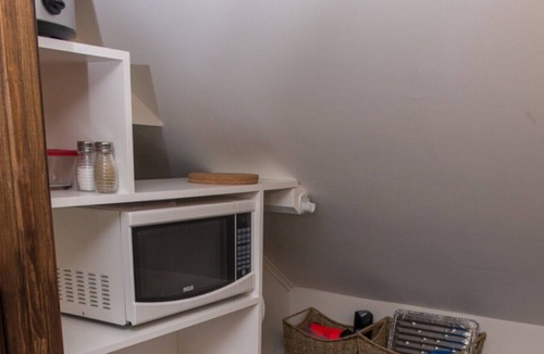 Jonquiere House | One bedroom apartment with balcony