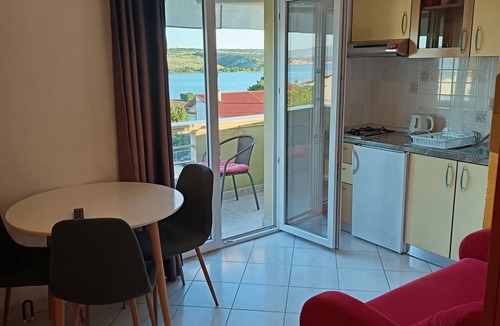 Posedarje Apartment | One bedroom apartment with balcony and sea view Posedarje, Novigrad (A-6190-b)