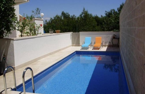 Supetar Apartment | One bedroom apartment with terrace Supetar, Brač (A-16774-a)