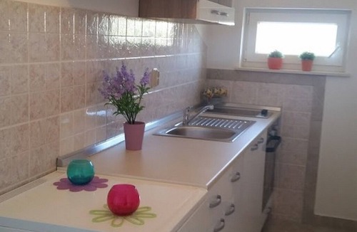 Kolan Apartment | One bedroom apartment with terrace and sea view Kolan, Pag (A-16482-a)