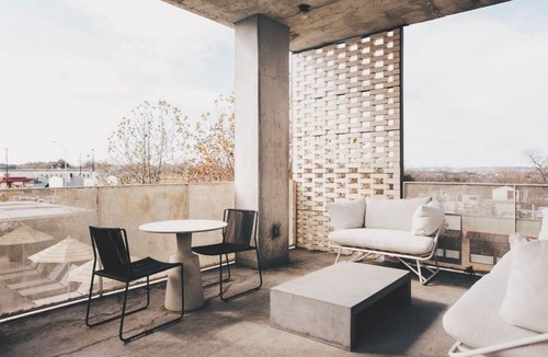 South River City Hotel | One-Bedroom Hotel Suite with Living Room & Outdoor Space