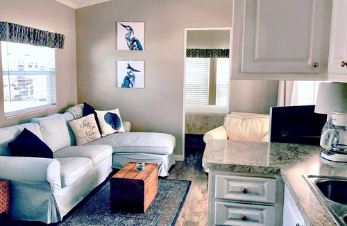 Miramar Beach Cottage | One block from the beach at Pompano Joes with large patio golf carts allowed