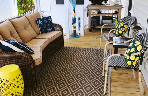 Miramar Beach Cottage | One block from the beach at Pompano Joes with large patio golf carts allowed