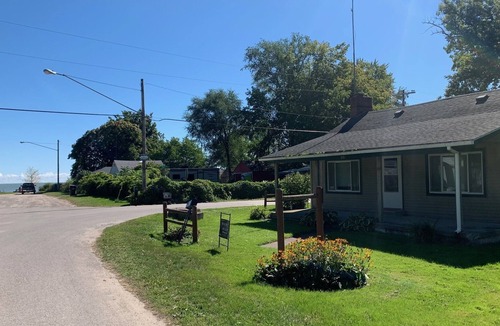 Standish House | One mile east of the Saganing Casino 50 feet from the beach, private boat launch