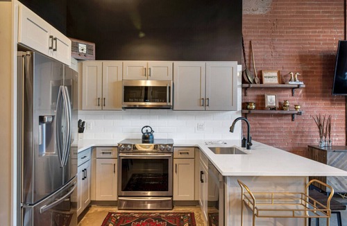 Nashville Condo | One-Of-A-Kind! Roll Up Garage Door, Pool, Speakeasy