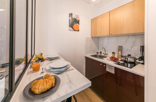 Quartier du Faubourg-Montmartre Apartment | Opéra - Rossini 26: cosy flat for 2