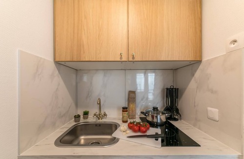 Quartier du Faubourg-Montmartre Apartment | Opéra - Rossini 26: cosy flat for 2