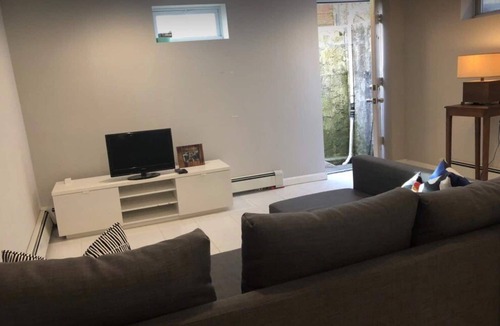 Greenlawn Apartment | Open bright airy basement apartment