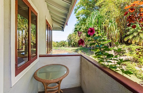 Honokaa House | Open concept villa with a tropical garden setting, lanai & patios