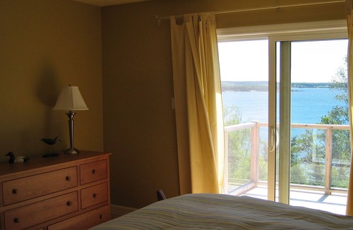 New River Beach House | Open Concept Waterfront Home On Private Sandy Beach