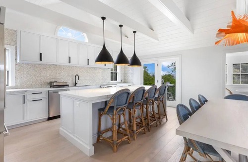 Madaket House | Open floor plan home with multiple decks