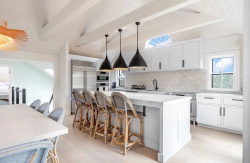 Madaket House | Open floor plan home with multiple decks